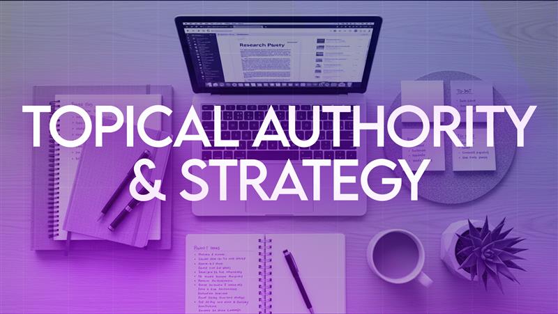 Overhead view of a workspace with a laptop and notes, visualizing the strategic content planning and research required for building strong topical authority in 2026 SEO.